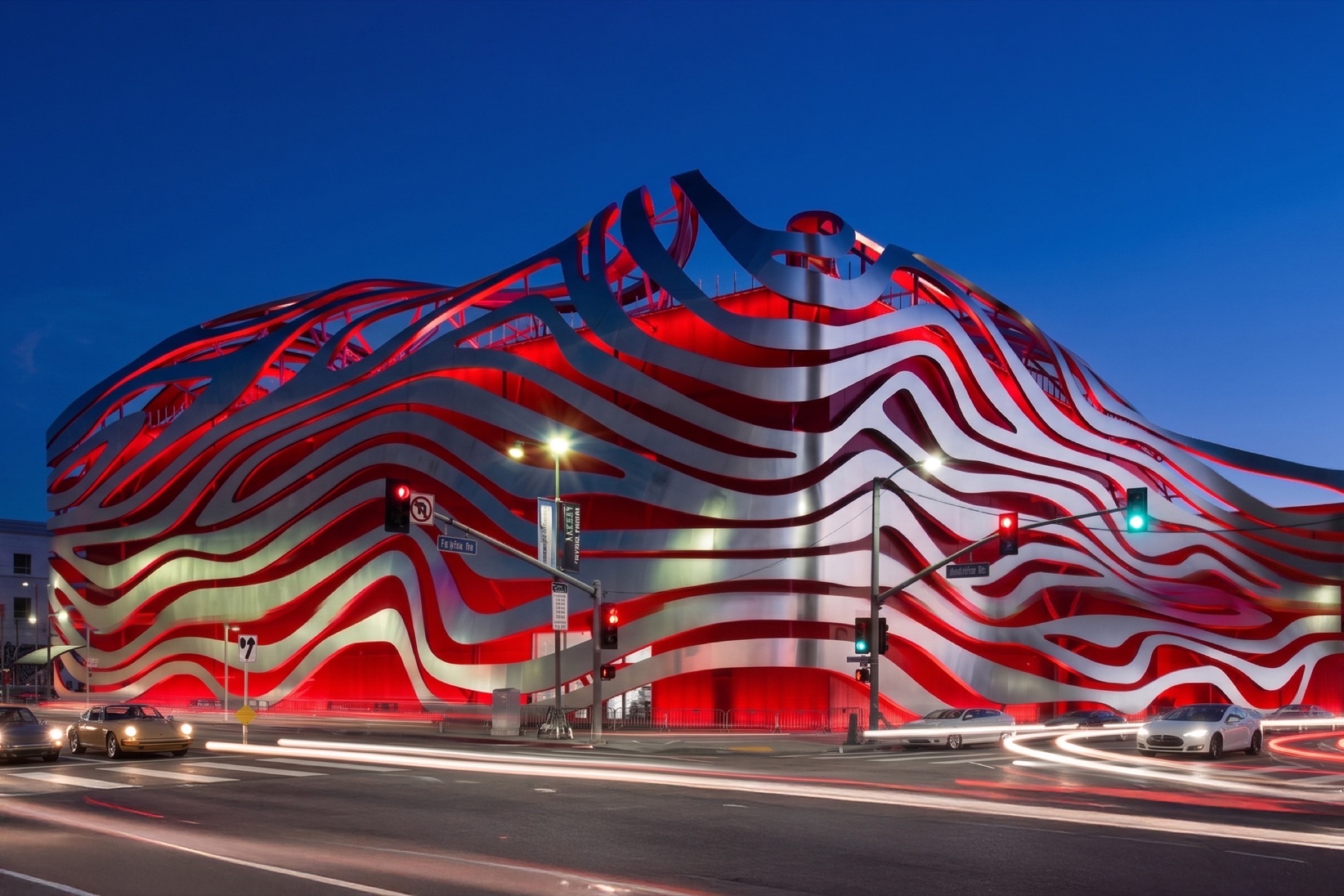 Petersen Automotive Museum exterior illuminated at dusk